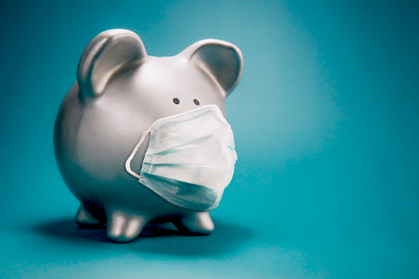 piggy bank wearing a breathing mask